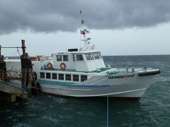 Das Fährboot von Sibulan nach Lioan
Zwischen zwei Regengüssen