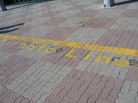 DON'T CROSS THE YELLOW LINE WITH AN PHOTO IN YOUR HAND!!