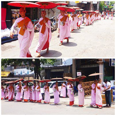 Alltägliches Bild in Myanmar, Mönche oder Nonnen auf ihrem Weg um Almosen zu sammeln