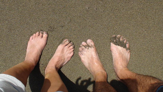 Grüner Sand, der seine Farbe durch das vulkanogene Olivin erhält.