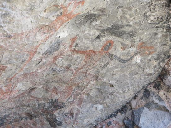 eine menschliche Figur und ein Deer