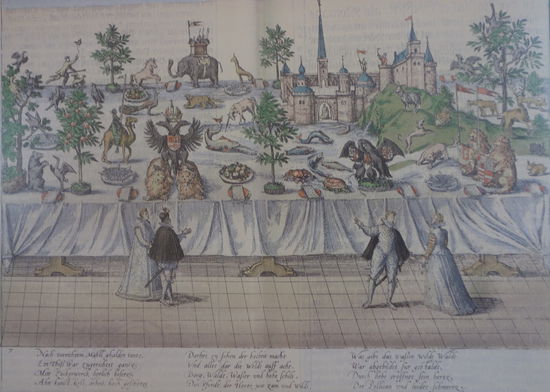 Das Zuckerbankett - eine Landschaft aus Zuckerwerk
Auf langer Tafel war ein "köstliches Bankett aus Zuckerwerk zugerichtet". Berge und Flüsse, Häuser und Schlösser mit Wald und Gehölz, darin viele heimische und fremde Tiere, schließlich die Wappen des Kaisers, der Brautleute und des alten Herzogs Wilhelm waren hier kunstvoll dargestellt. 
Wiedergabe Kupferstich Nr. 7 von Franz Hogenberg aus der "Fürstlich Jülichschen Hochzeit" von Dietrich Graminäus, 1587