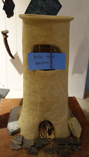 Modell eines Rennofens