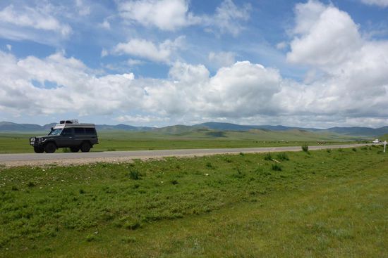 Grandiose Wolkenformationen in weiter Landschaft