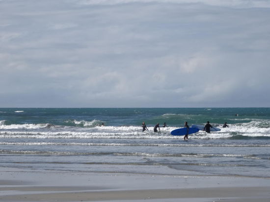 ......Surfer on Ohope Beach.....