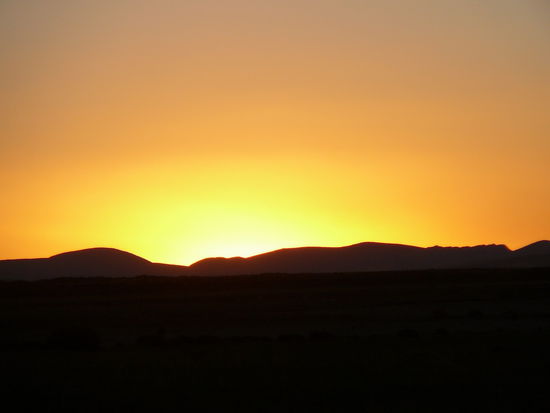 Sonnenuntergang vom Zug aus.