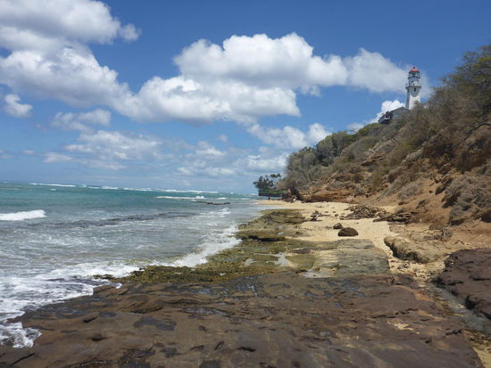 Surfer Strand mit Leuchtturm