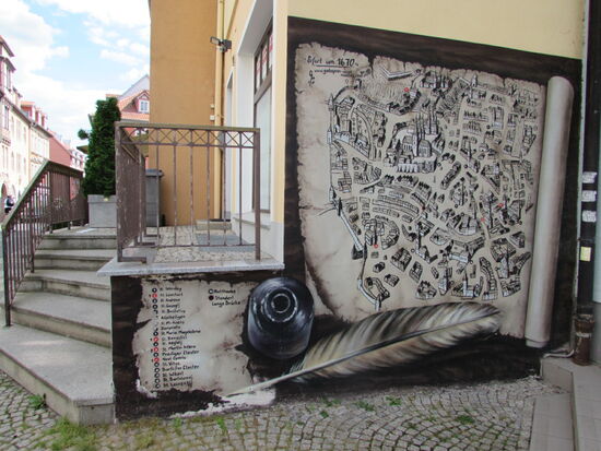 Hier hat ein Künstler das einstige Aussehen der Stadt dargestellt.