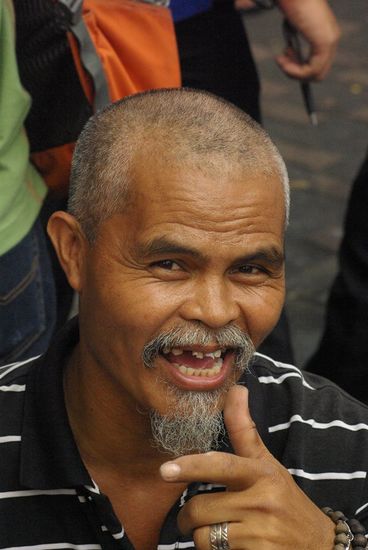 Ein Straßenhändler in Manila