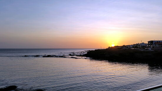 Sonnenuntergang über der Bucht von Praia