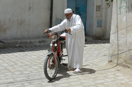 der Mopedfahrer