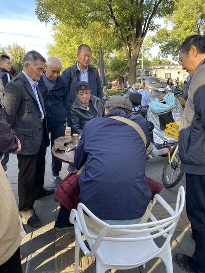 Mahjong-Spieler in den Hutongs