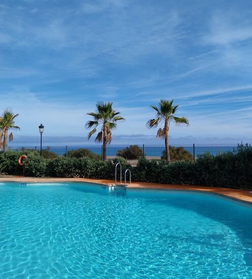 Campingplatz- La bella vista direkt am Meer bei Manilva- Pause am Swimmingpool mit Blick auf das Meer