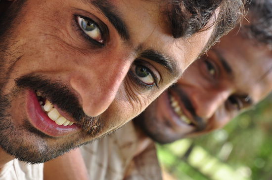 Freundliche Gaertner im Rosen und Jasmingarten von Islamabad