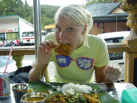 banana leaf chiken with rice and vegetables