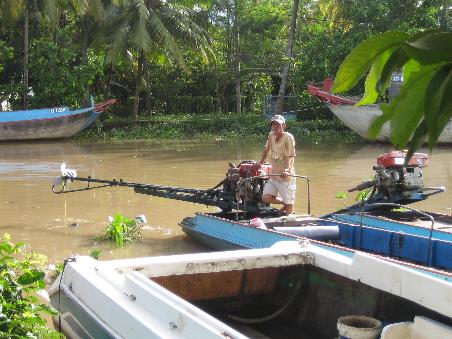 unser Skipper im Mekong Delta