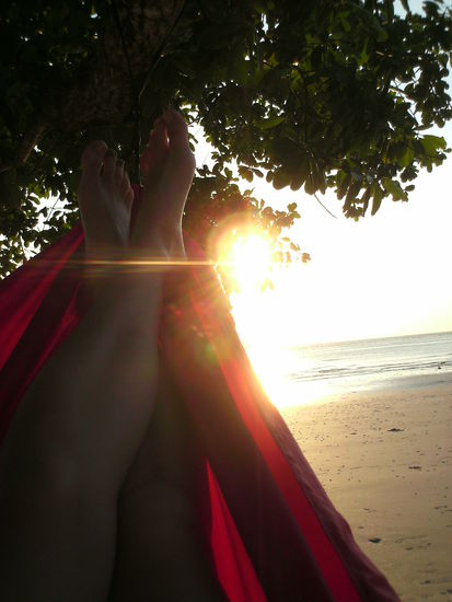 relaxen in der Haengematte am Strand