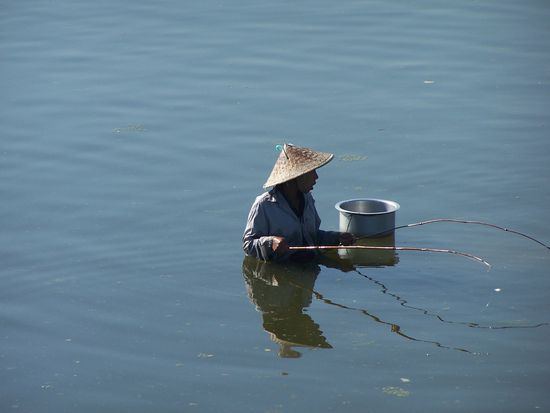 Taungthaman See -  berühmt für seine Teakholz-Brücke