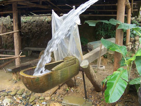 Ein wasserkraft-betriebene Maismehlstampfer