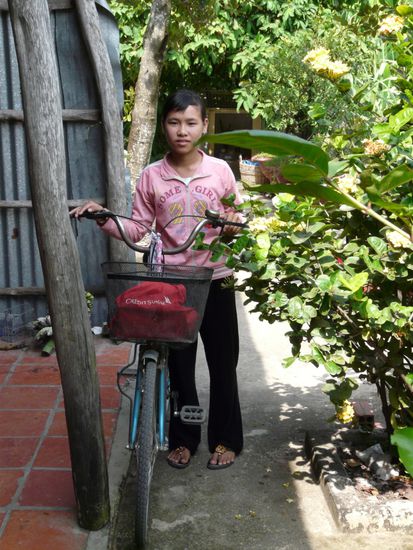 Huyen mit ihrem Fahrrad