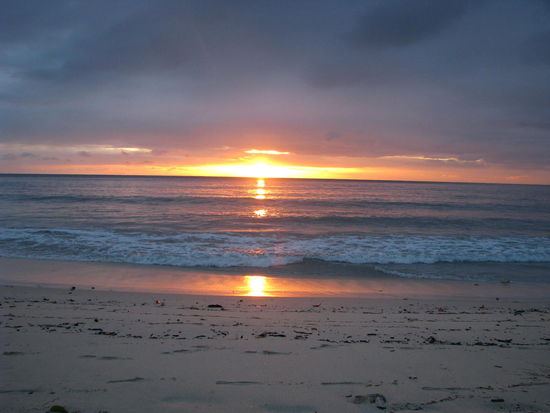 Zum Tagesabschluß die Belohnung der Sonnenuntergang an der Anse Louis