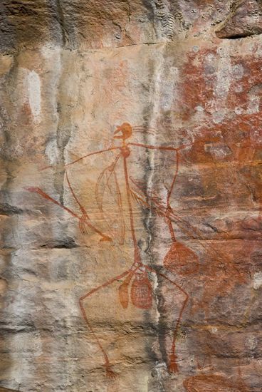 Ubirr Rock. Ein Jäger mit seinen Speeren.