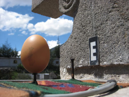 Egg on a nail on the equator