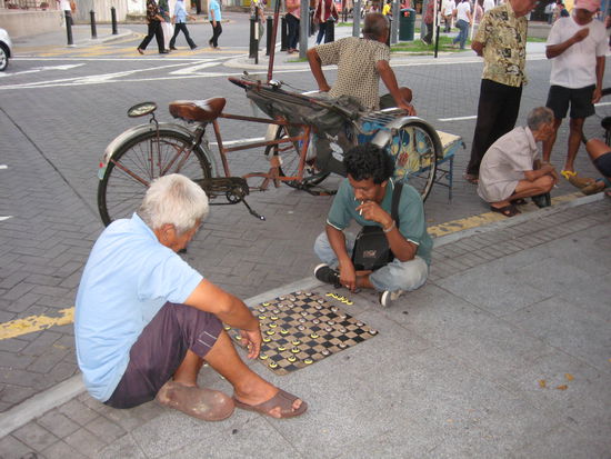 Playing nine man´s morris in Malaysia