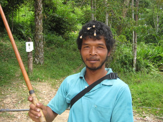 ... and hunting food with the blowgun.