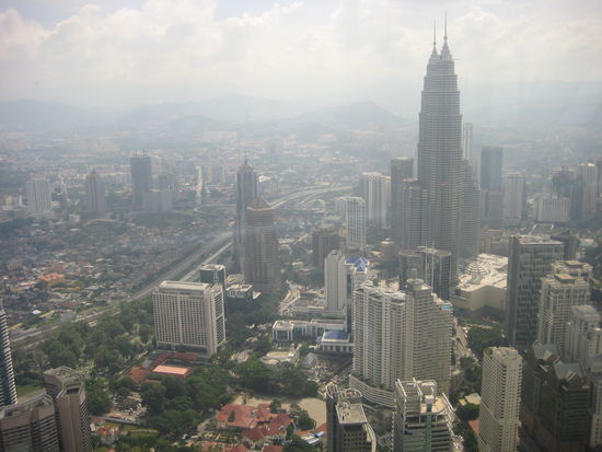 View from the Menara KL over KL and the Petronas Twin Towers