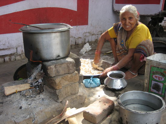 Granny cooking on the street