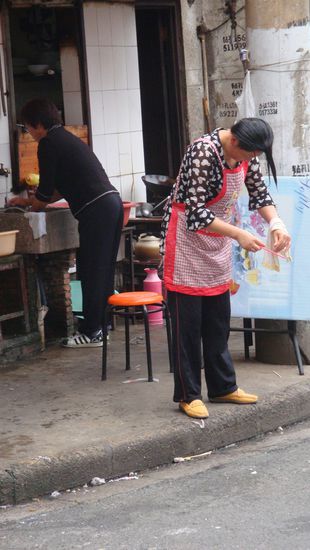 Haare-Krishna Freiluftfriseur