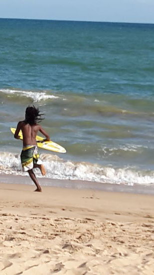 Strände sind nicht nur Strände - gelb golden in Tangalle - hier tummeln sich die Wellenreiter