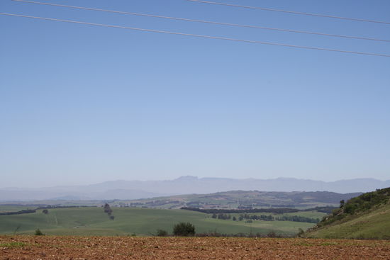 Midlands Meander - im Hintergrund die Drakensberge