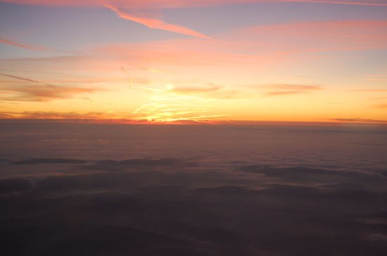 Sonnenaufgang über den Wolken