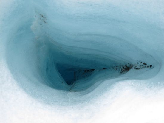 A few meters deep, blue and cold