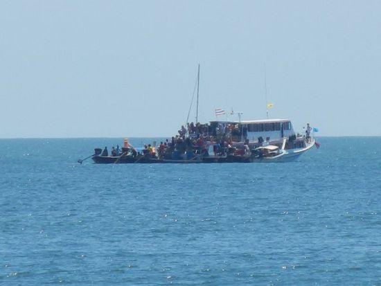Touristen fassen auf Thai Art
