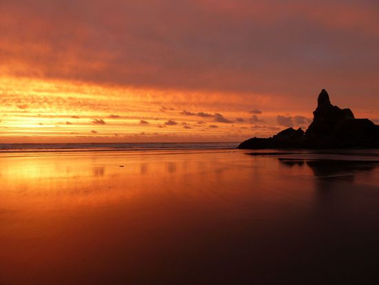 Sonnenuntergang am Piha Beach