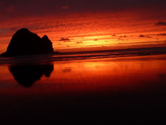 Sonnenuntergang am Piha Beach