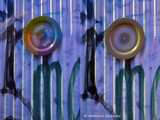 Eine vierfarbige Drehscheibe erscheint auf dem Foto im Drehmoment nur noch Goldfarben.....