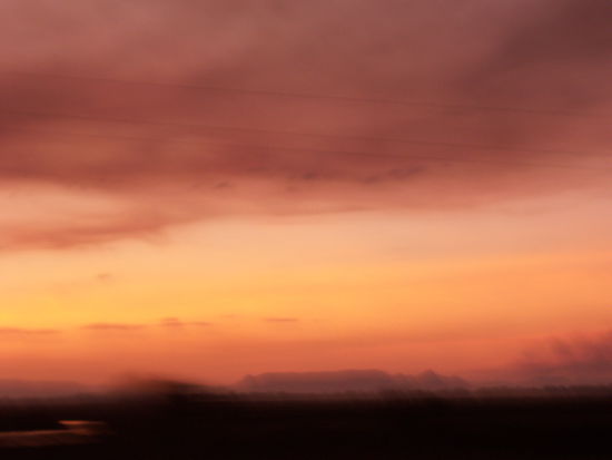 Der Versuch den unglaublich schönen Sonnenuntergang während der Fahrt festzuhalten