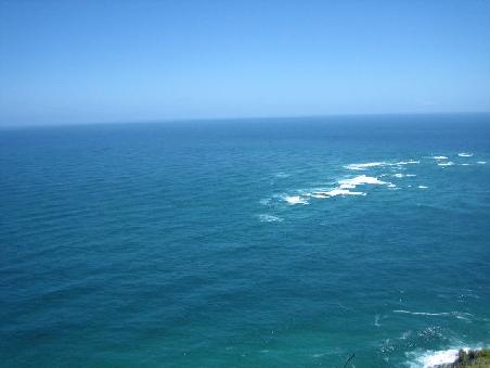 Meer am Cape Reinga, hier treffen das tasmanische Meer und der Pazifik aufeinander.