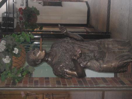 Frau mit Zigarre.