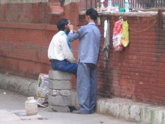 Frisoer auf den Strassen von Dehli