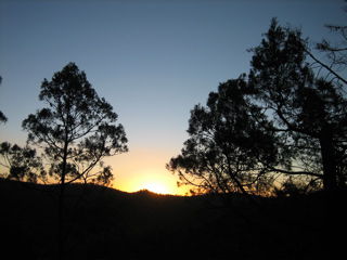 a sunset in the mountains