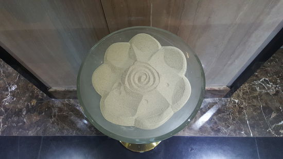 ...und liebevoll ist diese Blume aus Sand...