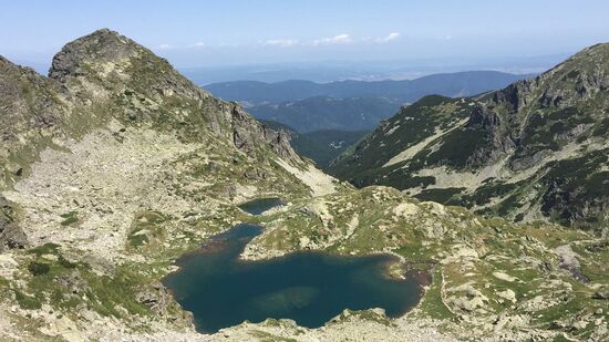 Thalia macht ein Foto vom Gipfel—nach weniger als 2 Stunden sind sie wieder unten—das ist fast ein Touri-Rekord!